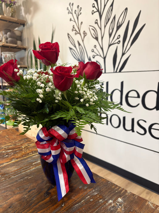 Half dozen red roses with patriotic bow