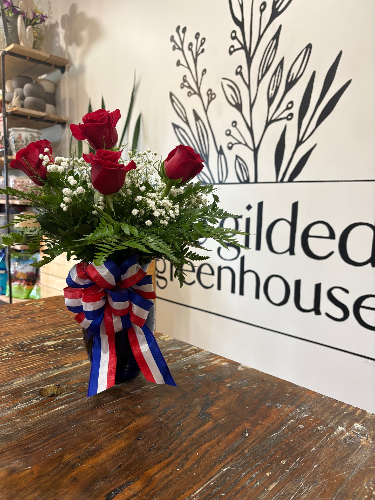 Half dozen red roses with patriotic bow
