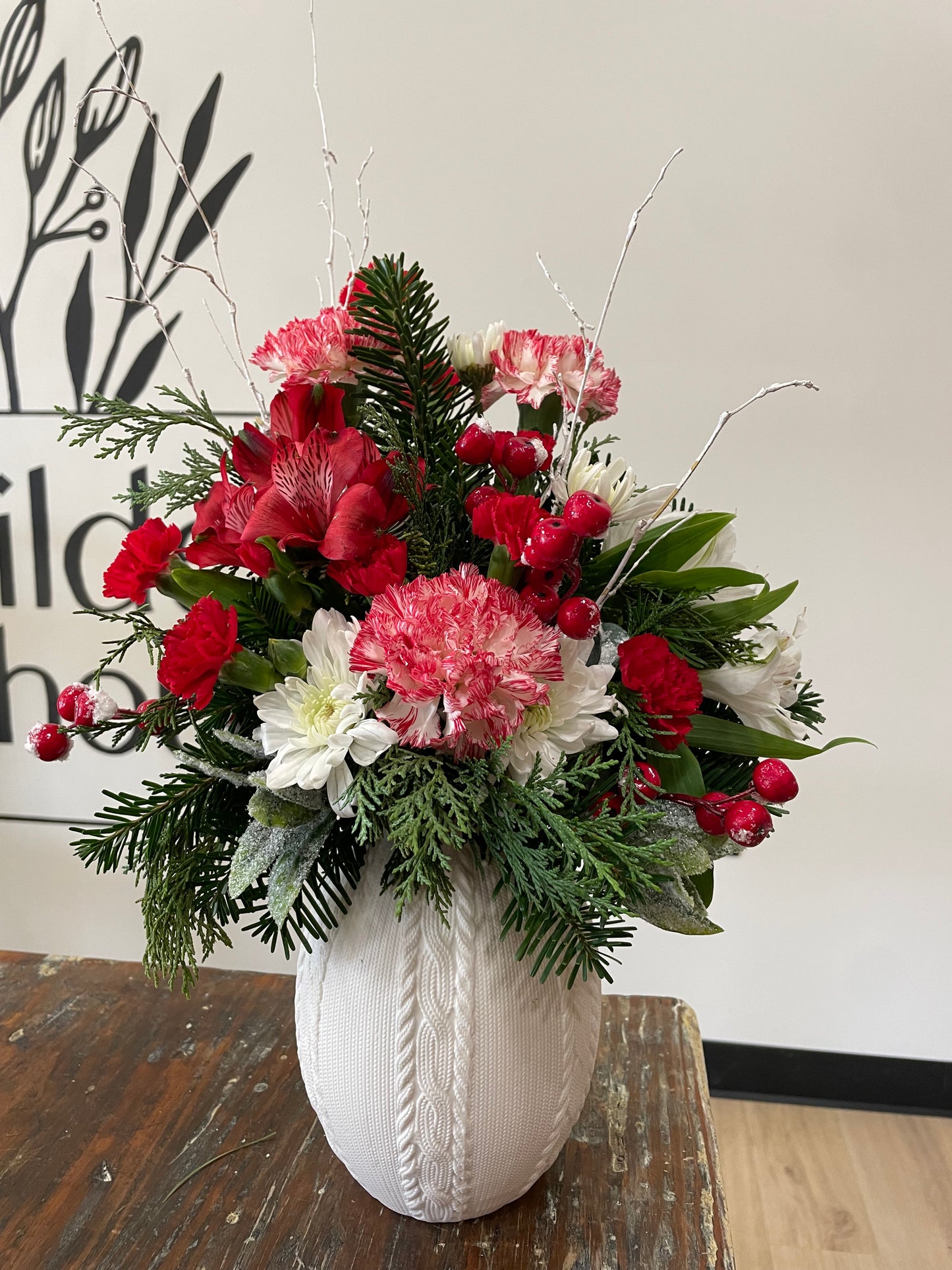White sweater vase arrangement