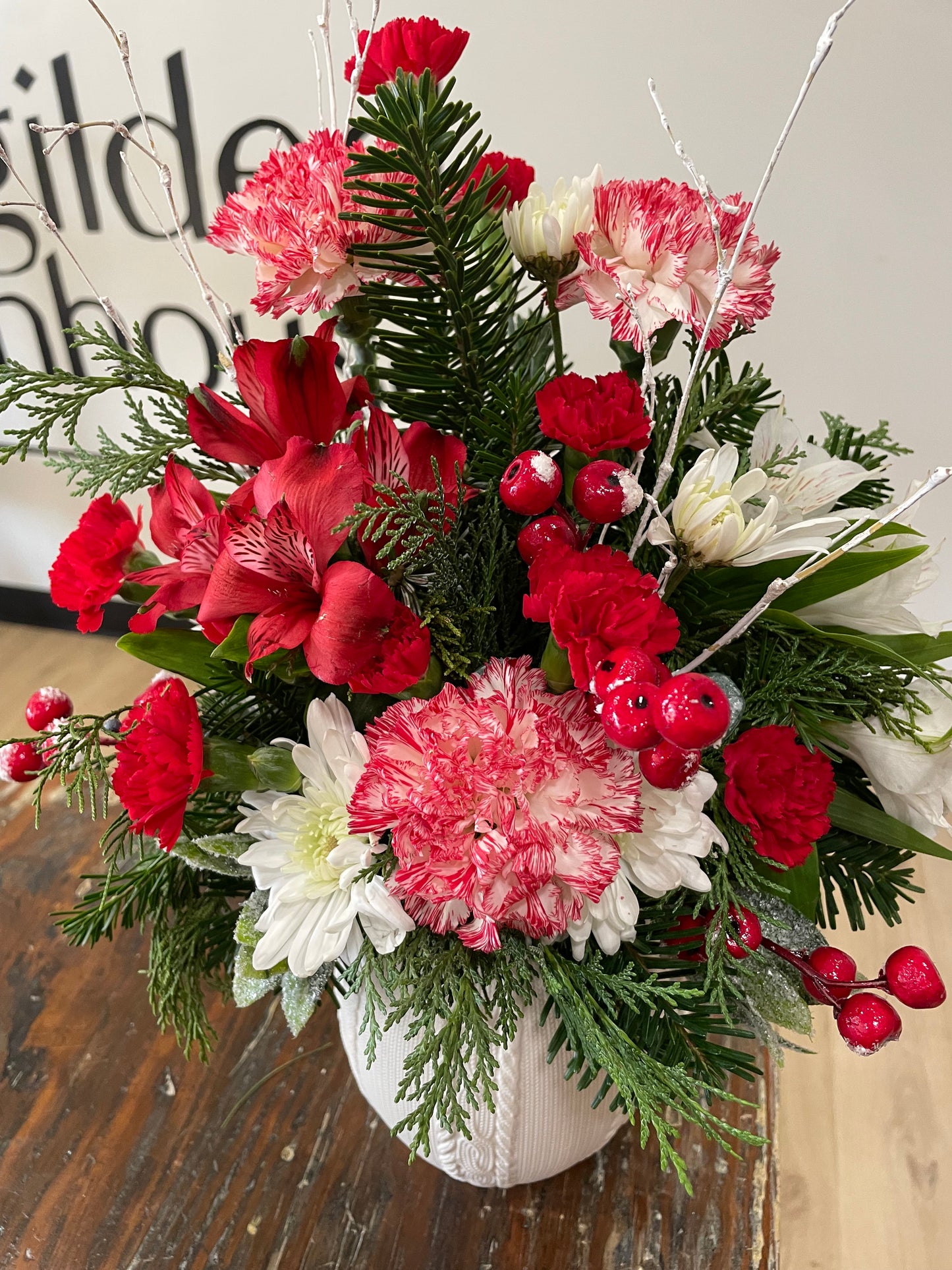 White sweater vase arrangement