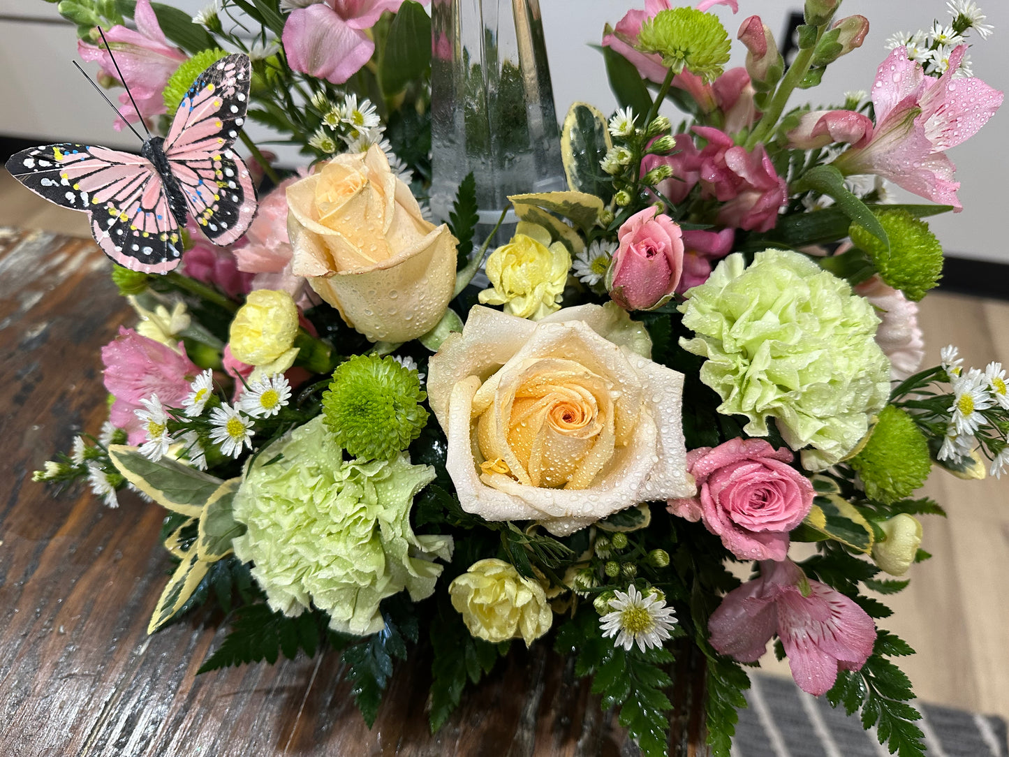 Spring-inspired glass cross